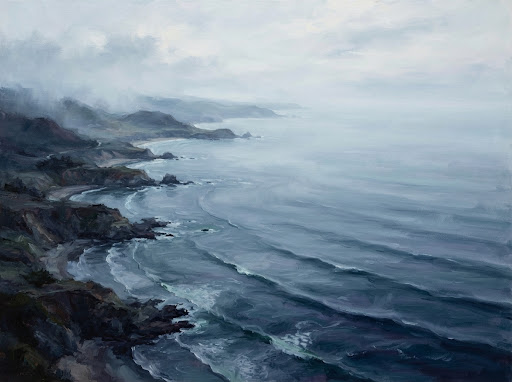 A vast painterly coastline fading into sea mist
